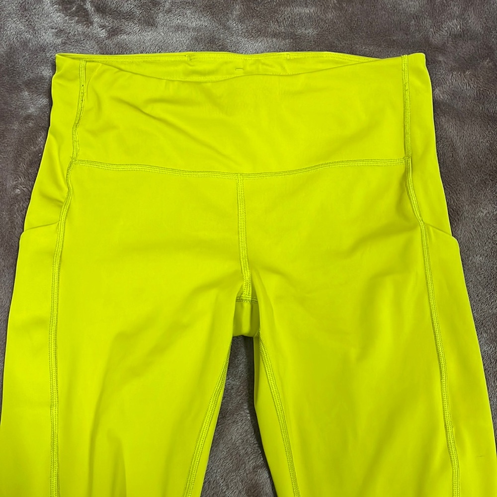 Athleta yellow leggings with pockets